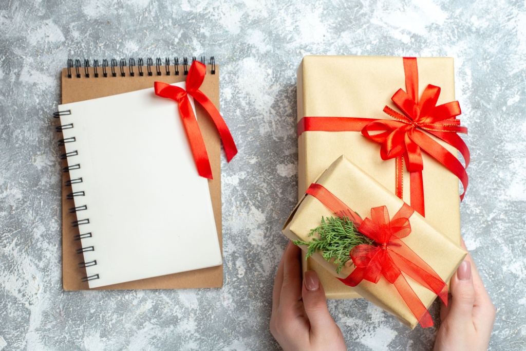 top-view-christmas-presents-with-red-bows-notepad-white-background (1).jpg top-view-christmas-presents-with-red-bows-notepad-white-background (1).jpg